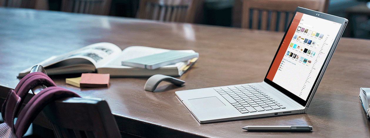 Laptop on a desk displaying a PowerPoint presentation add-in