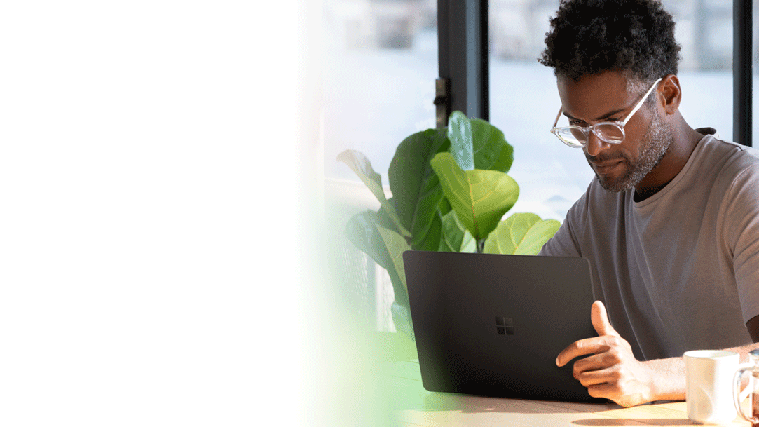 A man in an office developing a SharePoint site